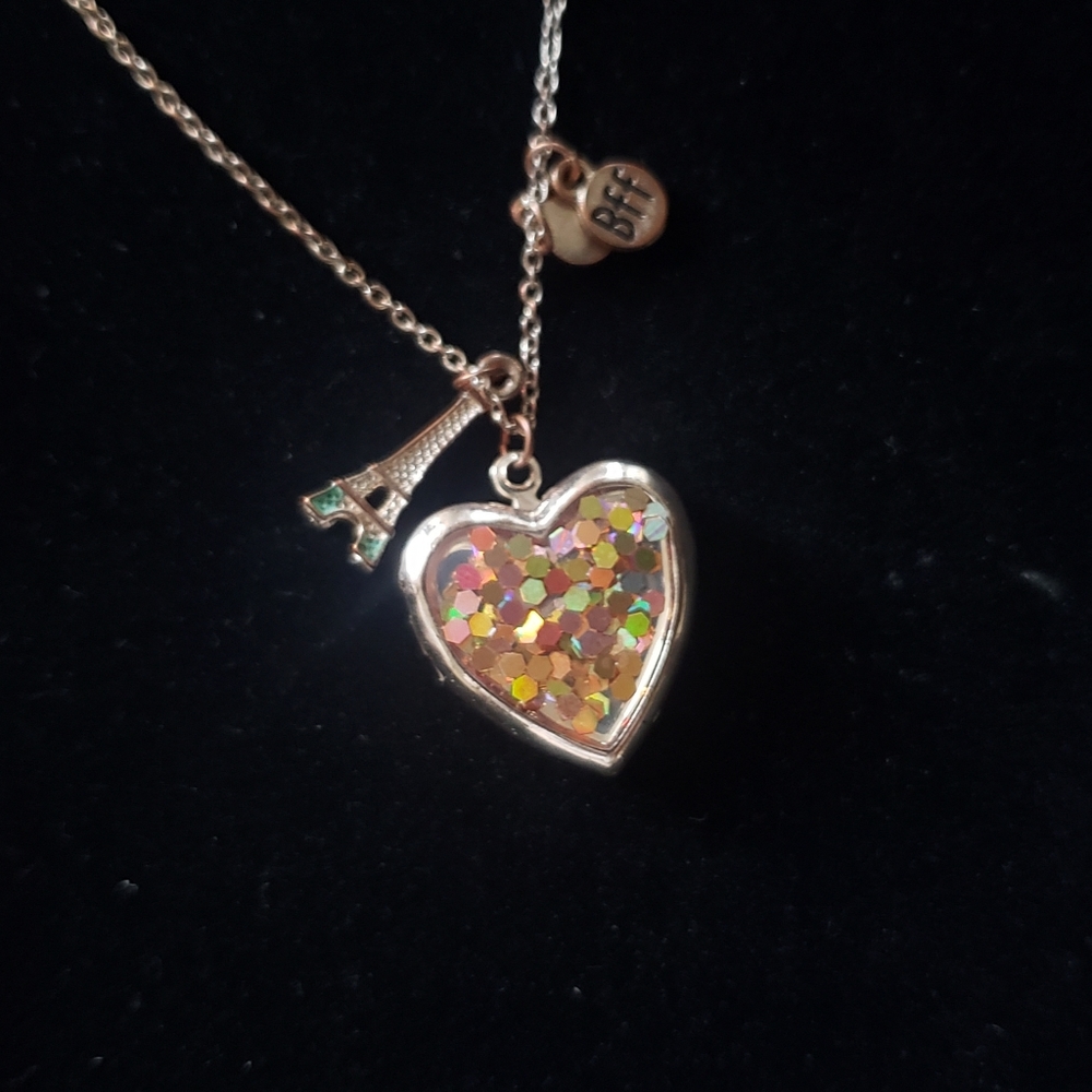 3/$20 Beautiful locket with charms (bff and aifle tower)